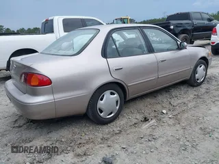 1998 Toyota Corolla VE z VIN 2T1BR18EXWC015480, wystawiony jako IAAI lot #41959316 z przebiegiem 224 304 mil mil oraz . Historia ofert i sprzedaży dostępna na DreamBid. Obrazek 4.