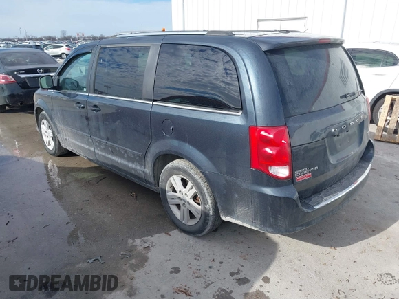 2013 Dodge Grand Caravan Crew with VIN 2C4RDGDG9DR740086, listed as a IAAI auction lot 41362852 with 145,881 mi miles and . Bid and sale history available at DreamBid. Image 3.