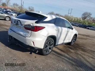 2017 Lexus RX with VIN JTJBZMCA3H2020914, listed as a IAAI auction lot 41940635 with 88,529 mi miles. Bid and sale history available at carsss.com. Image 4.