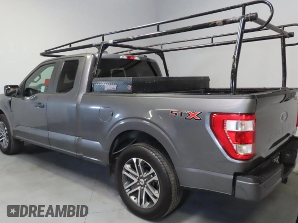 2021 Ford F-150 XL with VIN 1FTEX1CP3MKD17894, listed as a Copart auction lot 56984235 with 86,745 mi miles and Salvage title. Bid and sale history available at DreamBid. Image 4.