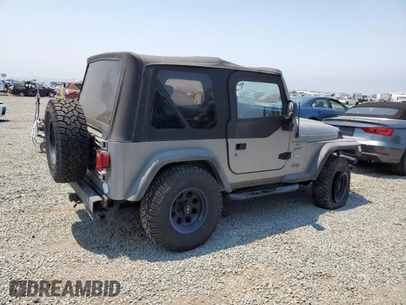2001 Jeep Wrangler Sport с VIN 1J4FA49S41P353878, выставлен на аукционе Copart как лот 64637385 с пробегом 166 642 миль миль и Списание • Salvage title. История ставок и продаж доступна на DreamBid. Изображение 3.