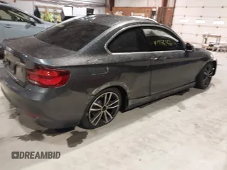 2020 BMW 2 Series 230i xDrive with VIN WBA2J3C07L7E64031, listed as a IAAI auction lot 41458356 with 43,594 mi miles. Bid and sale history available at carsss.com. Image 4.