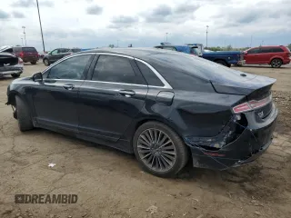 2014 Lincoln MKZ z VIN 3LN6L2GK5ER826026, wystawiony jako Copart lot #58941095 z przebiegiem 130 761 mil mil oraz Czysty tytuł • Clean title. Historia ofert i sprzedaży dostępna na DreamBid. Obrazek 2.