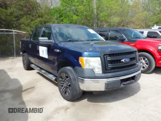 2013 Ford F-150 XL with VIN 1FTFW1CF2DKE57224, listed as a IAAI auction lot 41940686 with 148,482 mi miles. Bid and sale history available at carsss.com. Image 1.