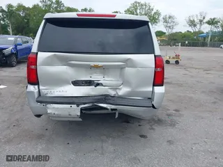 2019 Chevrolet Suburban LT with VIN 1GNSCHKC6KR372891, listed as a IAAI auction lot 41870878 with 92,161 mi miles. Bid and sale history available at carsss.com. Image 6.