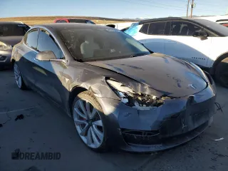 2019 Tesla Model 3 Long Range with VIN 5YJ3E1EB8KF477004, listed as a Copart auction lot 86192984 with 0 mi miles and Salvage Title. Bid and sale history available at carsss.com. Image 4.
