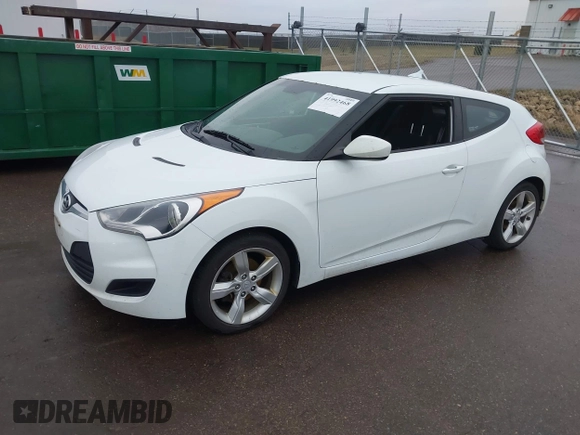 2013 Hyundai Veloster w/Gray Int with VIN KMHTC6AD8DU171050, listed as a IAAI auction lot 41992468 with 186,714 mi miles and . Bid and sale history available at DreamBid. Image 2.