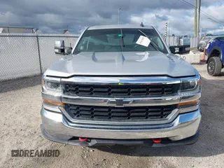 2018 Chevrolet Silverado 1500 LT with VIN 1GCRCREC5JZ138622, listed as a IAAI auction lot 41631828 with Not Provided miles and . Bid and sale history available at DreamBid. Image 12.