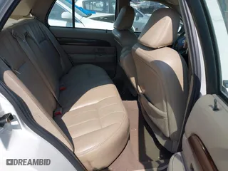 2003 Mercury Grand Marquis LS Premium with VIN 2MEFM75W33X669341, listed as a IAAI auction lot 42063018 with 124,047 mi miles. Bid and sale history available at carsss.com. Image 8.