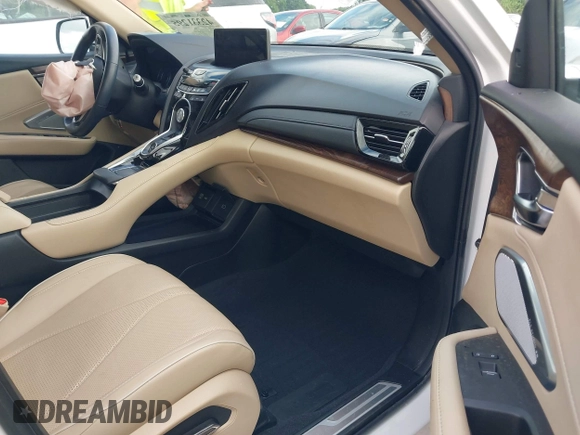 2020 Acura RDX Advance with VIN 5J8TC2H79LL033018, listed as a IAAI auction lot 42331295 with 53,015 mi miles and . Bid and sale history available at DreamBid. Image 5.