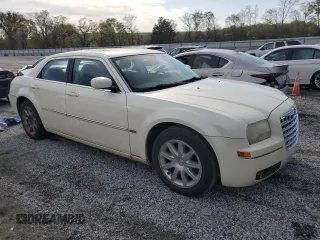2008 Chrysler 300 Touring with VIN 2C3LA53G08H137189, listed as a Copart auction lot 51606965 with 193,323 mi miles and Salvage Title. Bid and sale history available at carsss.com. Image 4.