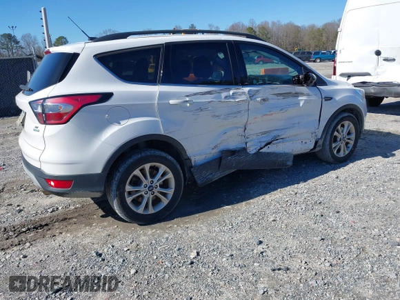 2017 Ford Escape SE with VIN 1FMCU0GD5HUB96432, listed as a IAAI auction lot 38731188 with 94,473 mi miles. Bid and sale history available at carsss.com. Image 4.