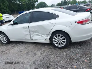 2011 Mazda 6 i Grand Touring z VIN 1YVHZ8CHXB5M11866, wystawiony jako IAAI lot #42412635 z przebiegiem 237 607 mil mil oraz . Historia ofert i sprzedaży dostępna na DreamBid. Obrazek 6.