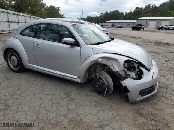 2013 Volkswagen Beetle Coupe 2.5L w/Sun with VIN 3VWJX7AT4DM613563, listed as a Copart auction lot 68335633 with NaN miles and Salvage Title. Bid and sale history available at carsss.com. Image 4.