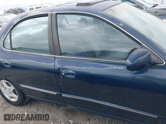 2000 Hyundai Elantra GLS with VIN KMHJF35F9YU990177, listed as a IAAI auction lot 41779807 with 175,114 mi miles and . Bid and sale history available at DreamBid. Image 14.