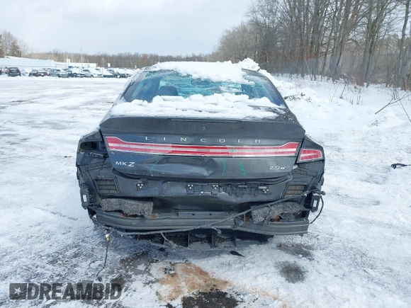 2015 Lincoln MKZ z VIN 3LN6L2J99FR606377, wystawiony jako IAAI lot #41597537 z przebiegiem 110 746 mil mil oraz . Historia ofert i sprzedaży dostępna na DreamBid. Obrazek 16.