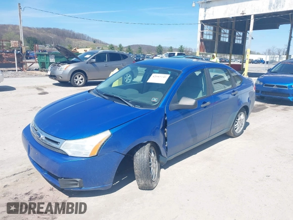 2011 Ford Focus SE with VIN 1FAHP3FN2BW111187, listed as a IAAI auction lot 42003148 with 119,083 mi miles. Bid and sale history available at carsss.com. Image 2.