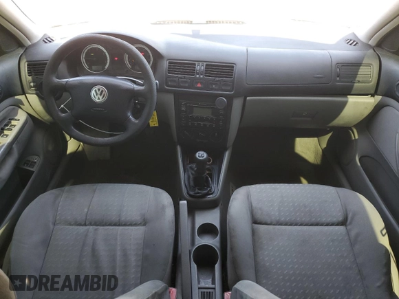 2004 Volkswagen Jetta GL z VIN 3VWRR69M74M128774, wystawiony jako Copart lot #46566225 z przebiegiem 539 544 mil mil oraz Szkoda całkowita • Salvage title. Historia ofert i sprzedaży dostępna na DreamBid. Obrazek 8.