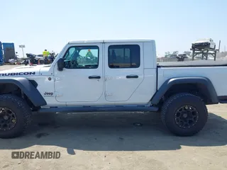 2021 Jeep Gladiator Rubicon с VIN 1C6JJTBG6ML504934, выставлен на аукционе IAAI как лот 42451700 с пробегом 49 952 миль миль и . История ставок и продаж доступна на DreamBid. Изображение 14.