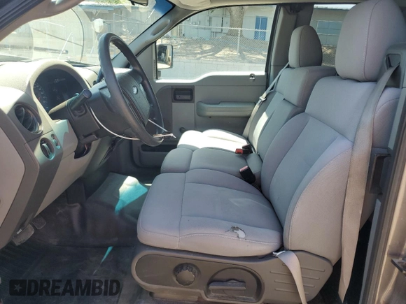 2006 Ford F-150 STX with VIN 1FTRX02W06KB84129, listed as a Copart auction lot 60349115 with 132,768 mi miles and Salvage title. Bid and sale history available at DreamBid. Image 7.