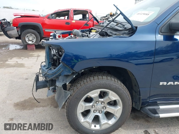 2019 Ram 1500 Big Horn/Lone Star with VIN 1C6SRFFT7KN663677, listed as a IAAI auction lot 40325088 with 77,035 mi miles. Bid and sale history available at carsss.com. Image 21.