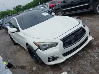 2014 Infiniti Q50 Premium z VIN JN1BV7AR4EM699815, wystawiony jako IAAI lot #42353600 z przebiegiem 104 900 mil mil oraz . Historia ofert i sprzedaży dostępna na DreamBid. Obrazek 1.