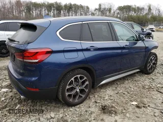 2021 BMW X1 xDrive28i z VIN WBXJG9C06M5T81056, wystawiony jako Copart lot #48388235 z przebiegiem 64 863 mil mil oraz Szkoda całkowita • Salvage title. Historia ofert i sprzedaży dostępna na DreamBid. Obrazek 3.
