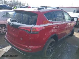 2016 Toyota RAV4 SE with VIN JTMJFREV2GJ073953, listed as a IAAI auction lot 41359423 with 98,641 mi miles. Bid and sale history available at carsss.com. Image 4.