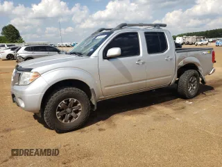 2016 Nissan Frontier Pro-4X with VIN 1N6AD0EV0GN797437, listed as a Copart auction lot 54203245 with 131,021 mi miles and Salvage title. Bid and sale history available at DreamBid. Image 1.