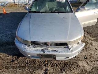 1999 Mitsubishi Galant ES with VIN 4A3AA46G0XE002483, listed as a Copart auction lot 47401435 with 212,154 mi miles and Salvage Title. Bid and sale history available at carsss.com. Image 12.