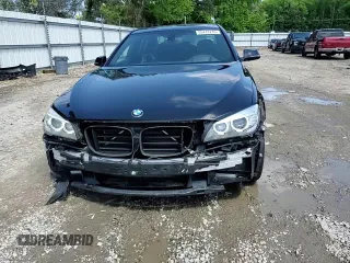 2015 BMW 7 Series 740i z VIN WBAYA6C59FD826788, wystawiony jako Copart lot #55747215 z przebiegiem 134 960 mil mil oraz Szkoda całkowita • Salvage title. Historia ofert i sprzedaży dostępna na DreamBid. Obrazek 14.