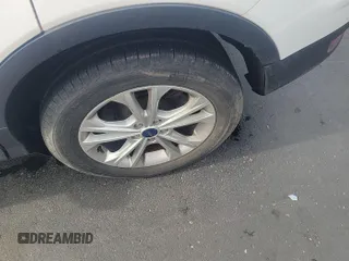 2017 Ford Escape SE z VIN 1FMCU0GD8HUE17862, wystawiony jako IAAI lot #42400277 z przebiegiem 68 381 mil mil oraz . Historia ofert i sprzedaży dostępna na DreamBid. Obrazek 1.