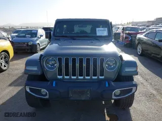 2023 Jeep Wrangler 4xe Sahara with VIN 1C4JJXP68PW661190, listed as a IAAI auction lot 41816483 with 41,877 mi miles. Bid and sale history available at carsss.com. Image 12.
