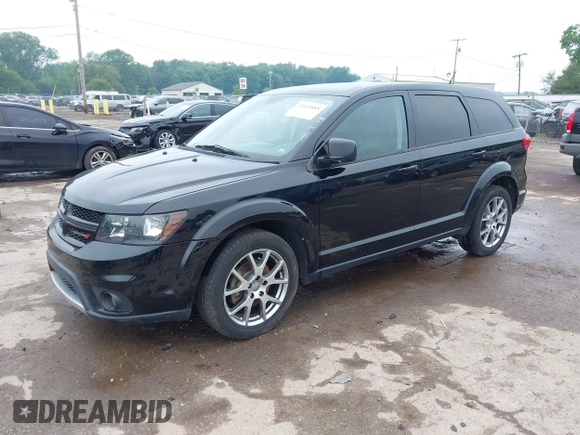 2015 Dodge Journey R/T with VIN 3C4PDDEG1FT554904, listed as a IAAI auction lot 42415888 with 143,039 mi miles and . Bid and sale history available at DreamBid. Image 2.
