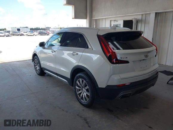 2019 Cadillac XT4 FWD Premium Luxury z VIN 1GYFZCR49KF142039, wystawiony jako IAAI lot #42259448 z przebiegiem 47 620 mil mil oraz . Historia ofert i sprzedaży dostępna na DreamBid. Obrazek 3.