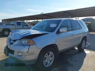 2004 Acura MDX Touring Pkg w/Navigation with VIN 2HNYD18804H546977, listed as a IAAI auction lot 41345964 with 161,856 mi miles. Bid and sale history available at carsss.com. Image 19.