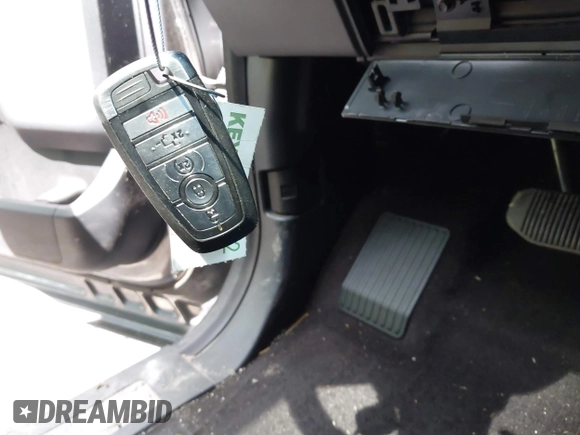 2021 Ford F-150 XL with VIN 1FTFW1E87MFC59701, listed as a IAAI auction lot 42288926 with Not provided miles and . Bid and sale history available at DreamBid. Image 11.