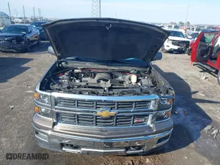 2014 Chevrolet Silverado 1500 LT with VIN 3GCUKRECXEG281990, listed as a IAAI auction lot 41535853 with 142,702 mi miles. Bid and sale history available at carsss.com. Image 10.