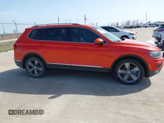 2018 Volkswagen Tiguan SEL Premium with VIN 3VV5B7AX8JM116146, listed as a IAAI auction lot 41738184 with 163,731 mi miles and . Bid and sale history available at DreamBid. Image 13.