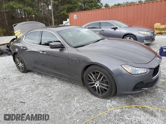 2014 Maserati Ghibli z VIN ZAM57XSA9E1096594, wystawiony jako Copart lot #47187285 z przebiegiem 114 050 mil mil oraz Szkody całkowita. Historia ofert i sprzedaży dostępna na DreamBid. Obrazek 4.