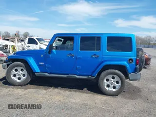 2015 Jeep Wrangler Unlimited Sahara z VIN 1C4HJWEG5FL650829, wystawiony jako IAAI lot #41824739 z przebiegiem 127 719 mil mil oraz . Historia ofert i sprzedaży dostępna na DreamBid. Obrazek 14.