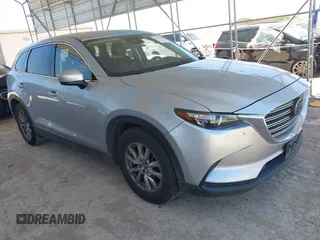 2018 Mazda CX-9 Touring with VIN JM3TCACY9J0224369, listed as a IAAI auction lot 42246792 with 80,169 mi miles and . Bid and sale history available at DreamBid. Image 1.