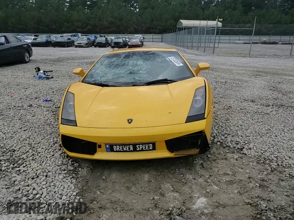 2004 Lamborghini Gallardo z VIN ZHWGU11SX4LA00563, wystawiony jako Copart lot #73732524 z przebiegiem 51 762 mil mil oraz Szkody całkowita. Historia ofert i sprzedaży dostępna na DreamBid. Obrazek 11.