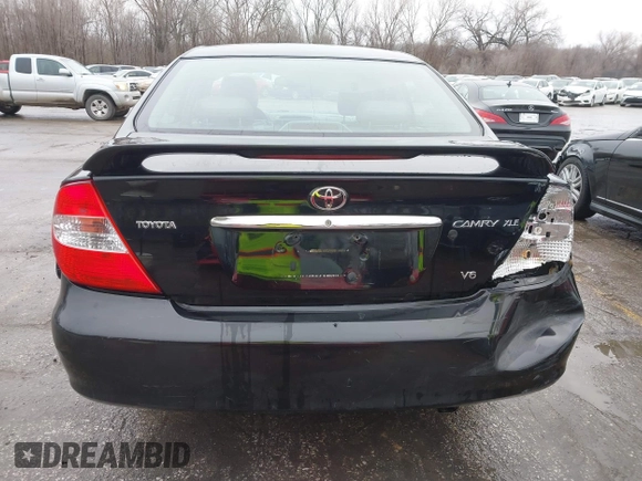 2004 Toyota Camry LE with VIN 4T1BF32K84U074364, listed as a IAAI auction lot 41479264 with 265,865 mi miles. Bid and sale history available at carsss.com. Image 16.