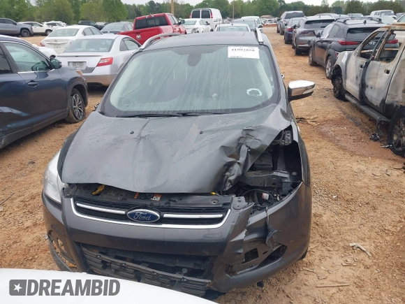 2015 Ford Escape Titanium with VIN 1FMCU9J90FUC14650, listed as a IAAI auction lot 41992858 with 158,963 mi miles and . Bid and sale history available at DreamBid. Image 12.