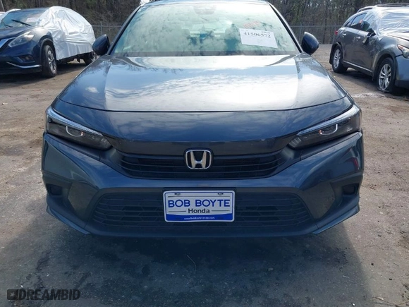 2023 Honda Civic Sedan LX with VIN 2HGFE2F29PH559554, listed as a IAAI auction lot 41506572 with 20,694 mi miles. Bid and sale history available at carsss.com. Image 12.