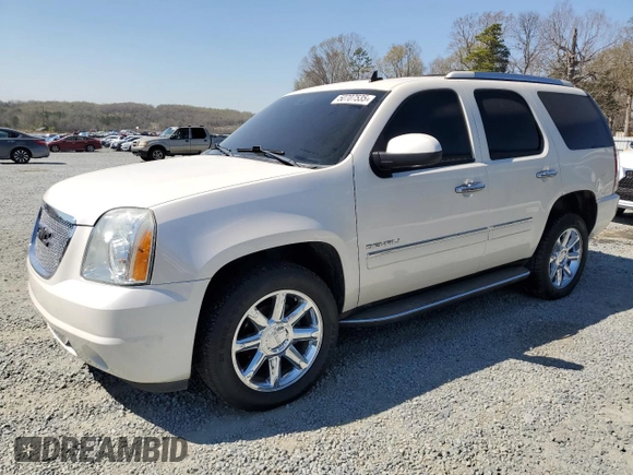 2013 GMC Yukon Denali with VIN 1GKS2EEF0DR326058, listed as a Copart auction lot 50707535 with 156,764 mi miles and Salvage Title. Bid and sale history available at carsss.com. Image 1.