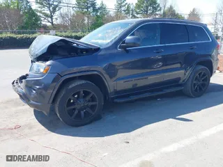 2015 Jeep Grand Cherokee Altitude with VIN 1C4RJFAG8FC954649, listed as a IAAI auction lot 41906591 with 76,804 mi miles. Bid and sale history available at carsss.com. Image 2.