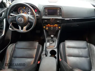 2014 Mazda CX-5 Grand Touring with VIN JM3KE4DY8E0301258, listed as a Copart auction lot 84248134 with 130,599 mi miles and Clean Title. Bid and sale history available at carsss.com. Image 8.