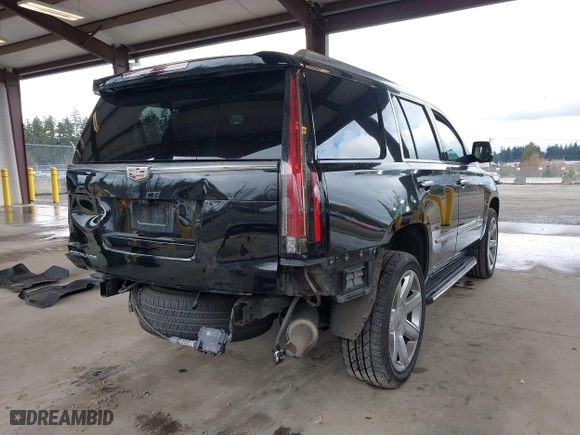 2019 Cadillac Escalade Premium Luxury with VIN 1GYS4CKJ7KR339349, listed as a IAAI auction lot 41706596 with 83,826 mi miles. Bid and sale history available at carsss.com. Image 4.